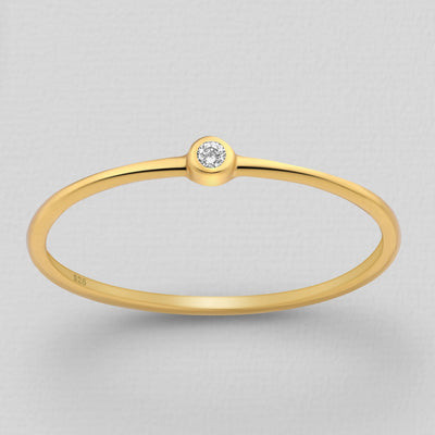 Gold Solitaire Ring Decorated with Cubic Zirconia